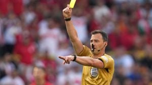 Soccer referee with yellow card