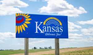 The Kansas Lottery unveiled its financial report for sports betting in October, reaching unprecedented heights in both handle and revenue. (Shutterstock/marekuliasz)