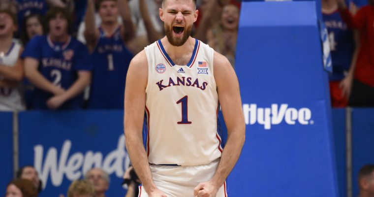 Kansas center Hunter Dickinson celebrates a three-point basket against North Carolina Central during the first half of an NCAA college basketball game in Lawrence, Kan., Monday, Nov. 6, 2023. (AP Photo/Reed Hoffmann)