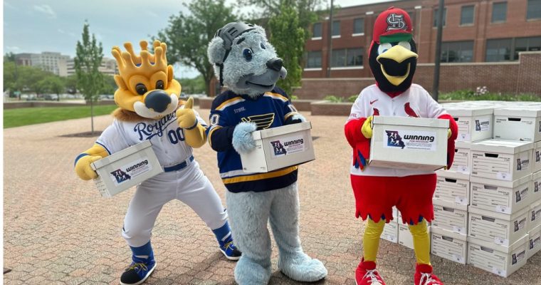 Mascots for the Kansas City Royals, St. Louis Blues and St. Louis Cardinals haul boxes of voter signatures collected in order to put a proposal to legalize Missouri sports betting on the ballot this year Thursday, May 2, 2024, outside the Secretary of State's Office in Jefferson City, Mo.