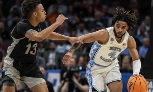 The second round of March Madness has tipped off, and we break down North Carolina vs. Michigan State odds and give our predictions.
