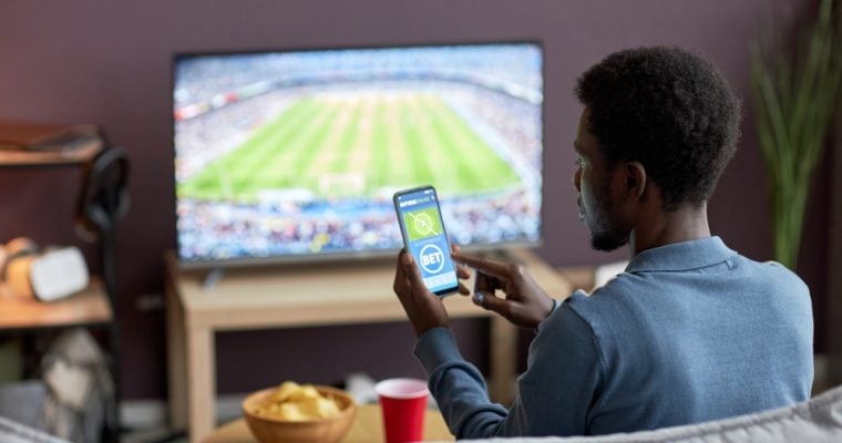 Sports betting operators have reduced their ad budgets by 21% since a peak in 2022, according to research performed by The Nielsen Company. (Shutterstock/SeventyFour)