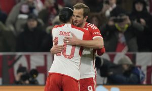 Bayern Munich player Harry Kane celebrates with Leroy Sane in the 2024 Champions League Round of 16 match