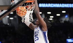 Duke basketball Mark Mitchell dunks against Vermont in the NCAA first round men's basketball tournament game