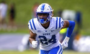 Duke football safety Cole Carteaux runs on the field in October 2021