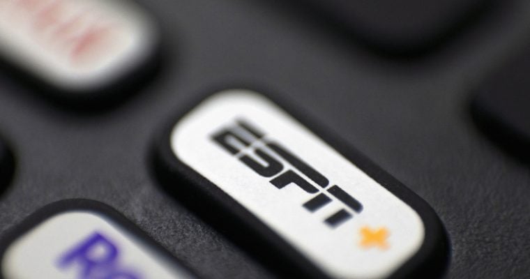 ESPN+ logo and button on remote control