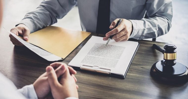 two people going over a ruling
