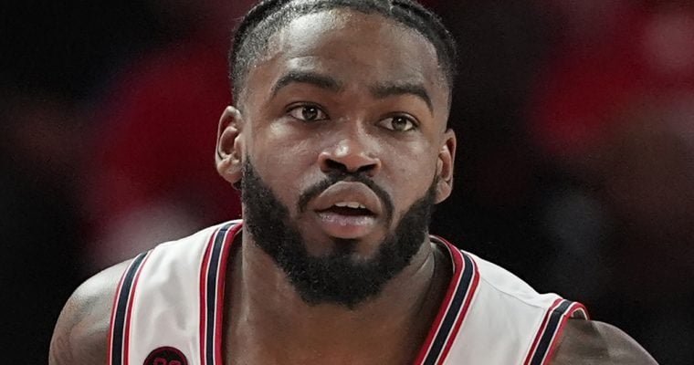 Houston basketball player Jamal Shead playing in a Big 12 game in February 2024