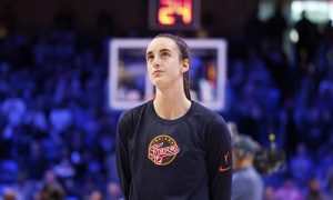 Indiana Fever guard Caitlin Clark on the court before a WNBA preseason game