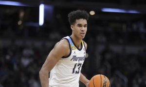 Marquette basketball player Oso Ighodaro plays against Colorado in the 2024 NCAA tournament second round