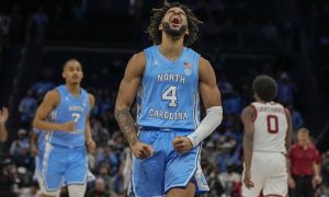 UNC Tar Heels basketball player RJ Davis celebrates against Oklahoma in 2023