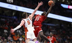 North Carolina State battle Syracuse in the second round of the 2024 ACC Men's Basketball Tournament
