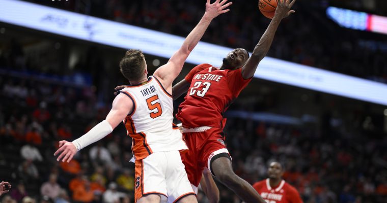 North Carolina State battle Syracuse in the second round of the 2024 ACC Men's Basketball Tournament