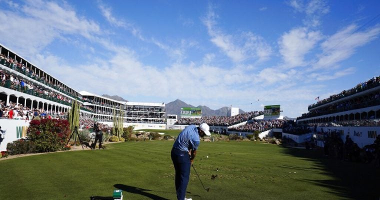 Scottie Scheffler tees off on the 16th hole during the final round of the Phoenix Open golf tournament, Sunday, Feb. 12, 2023