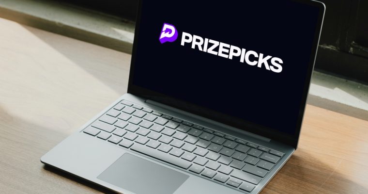 PrizePicks, a daily fantasy sports platform, logo displayed on laptop computer screen
