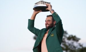 2024 Masters champion Scottie Scheffler holds the trophy