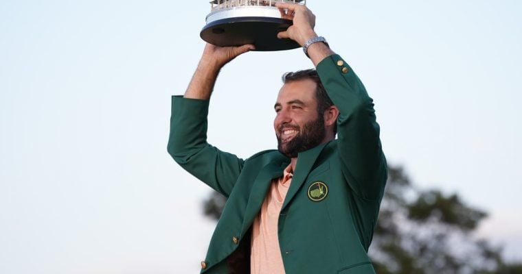 2024 Masters champion Scottie Scheffler holds the trophy