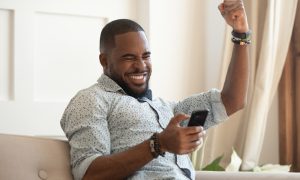 Sports bettor on mobile device