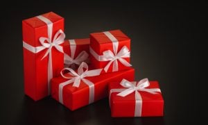 Composition,Of,Several,Gifts,Wrapped,In,Bright,Red,Brown,Paper