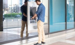 Man making cash withdrawal at ATM