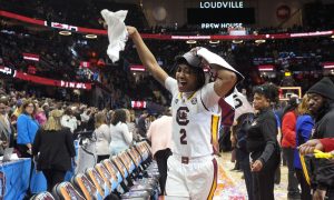 South Carolina player Ashlyn Watkins celebrates after beating Iowa in the 2024 Women's Basketball National Championship