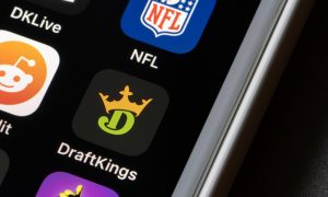 DraftKings logo on a mobile phone