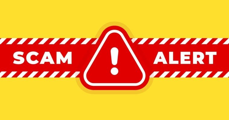 a red scam alert warning over a yellow background