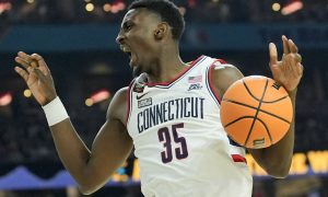 UConn Huskies basketball player Samson Johnson plays against Alabama in the 2024 NCAA Final Four