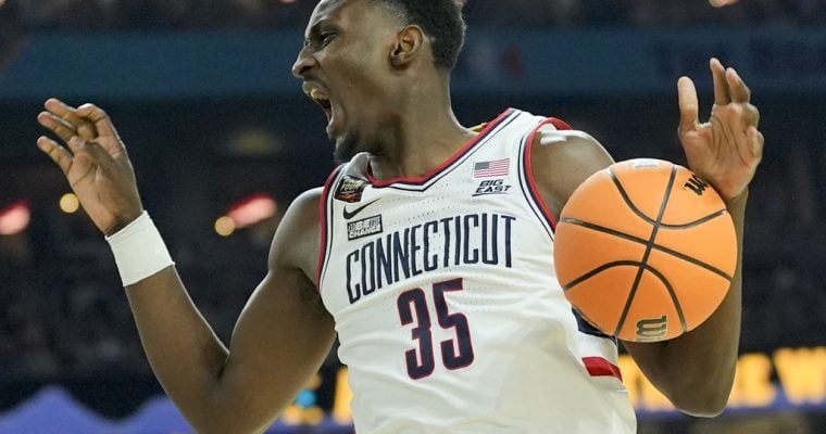 UConn Huskies basketball player Samson Johnson plays against Alabama in the 2024 NCAA Final Four