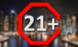a warning sign indicating you must be 21 or older