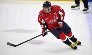 Washington Capitals player Alex Ovechkin goes up against the Pittsburgh Penguins in an April 2024 game